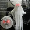 White dress, painted face, bride with a ghostly look