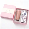 Pink le buckle coffee cup electric massage comb two-piece set