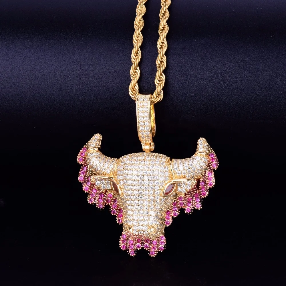 iced out bull pendant