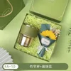 Taza decorativa con diseño floral y sección de bambú F-10.