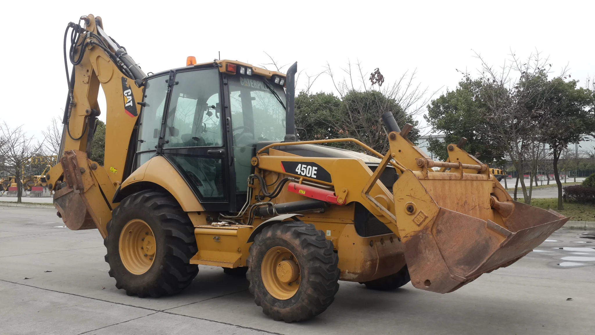 Caterpillar 450E Backhoe Loader - Durable & Versatile Machinery
