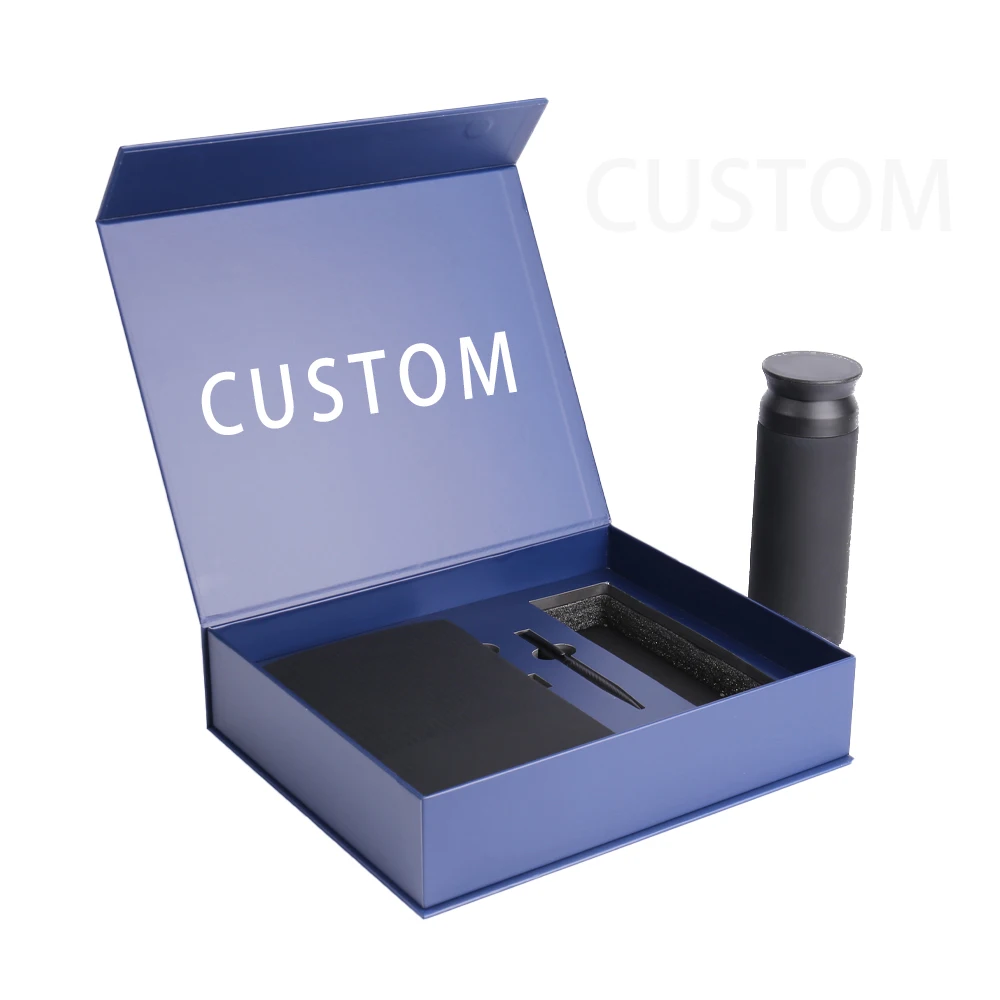 Scatola regalo blu di lusso personalizzata con apertura a ribalta magnetica, in carta rigida con effetto rilievato e rivestimento interno in spugna, per un’elegante confezione regalo aziendale.