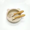 Ciotola in silicone a forma di orsetto color avorio con cucchiaio e forchetta in legno