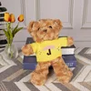 Maglione ombrello giallo orso bruno