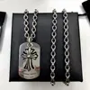 Hollow-out cross paired with letter necklace