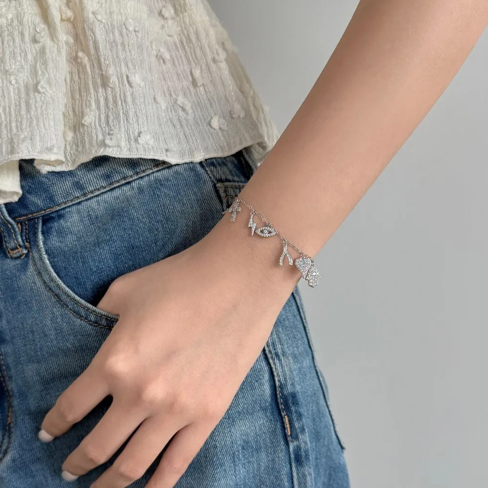 KAKODIY unique design 925 Sterling Silver multiple symbols octagonal thunder evil heart hand eye Y letter shape pendant zirconia bracelet detail 4