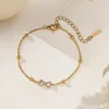 xkb0073-bracelet noeud zircon or