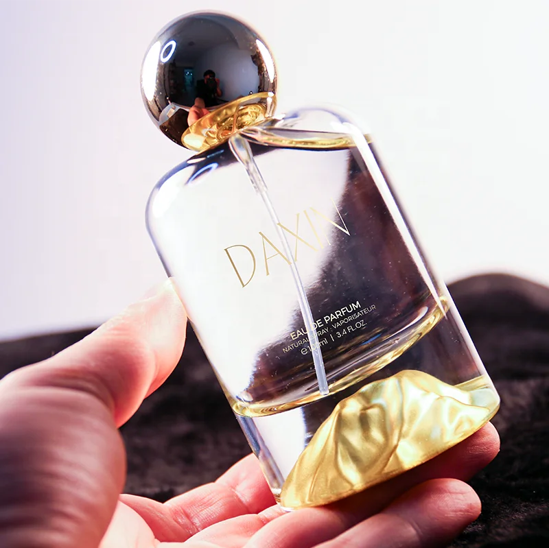 OEM/ODM 30ml 50ml 100ml Cylinder Glass Perfume Bottles with Gold Silver Blue Red Green Bottom for Gift Fragrance