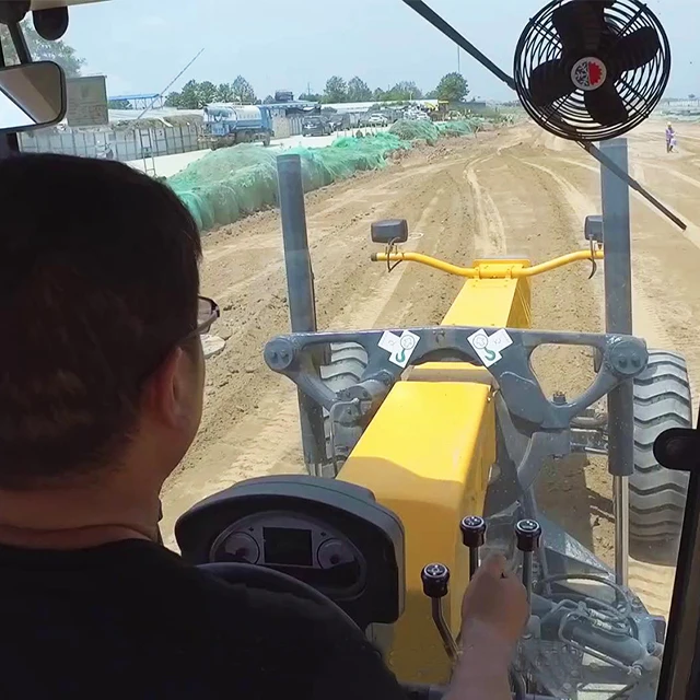 Running Laser and GPS Motor Grader with Front Blade and the Ripper