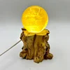 Wooden stake with lamp base