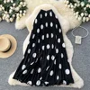 Black with large polka dots