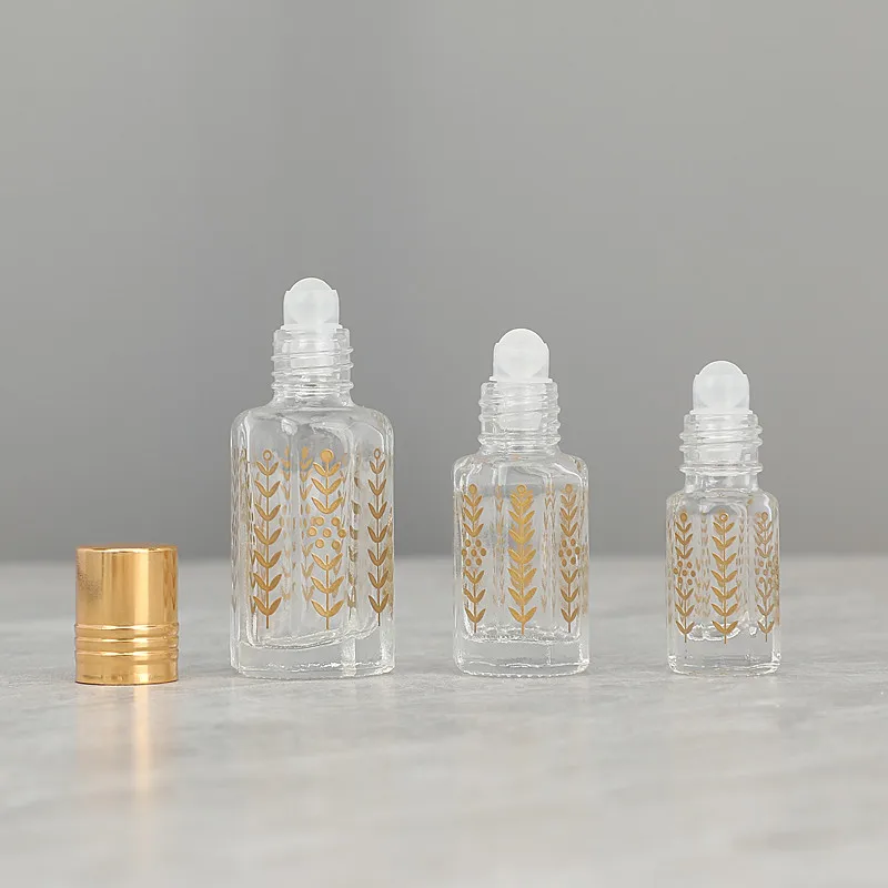 Top Grade 3ml 6ml 12ml Empty Golden Octagonal Essential Oil Roller Bottle Leaf-pattern Glass Roll on Perfume Bottle