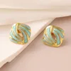 Pendientes azul lago con tachuelas