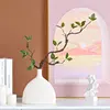 Wine pot, ceramic vase, withered branches and green leaves