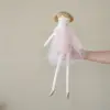 Bambola con vestito rosa