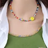 Collar de cuentas con caritas sonrientes.