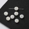 Perles de lettres en coquillage -- O