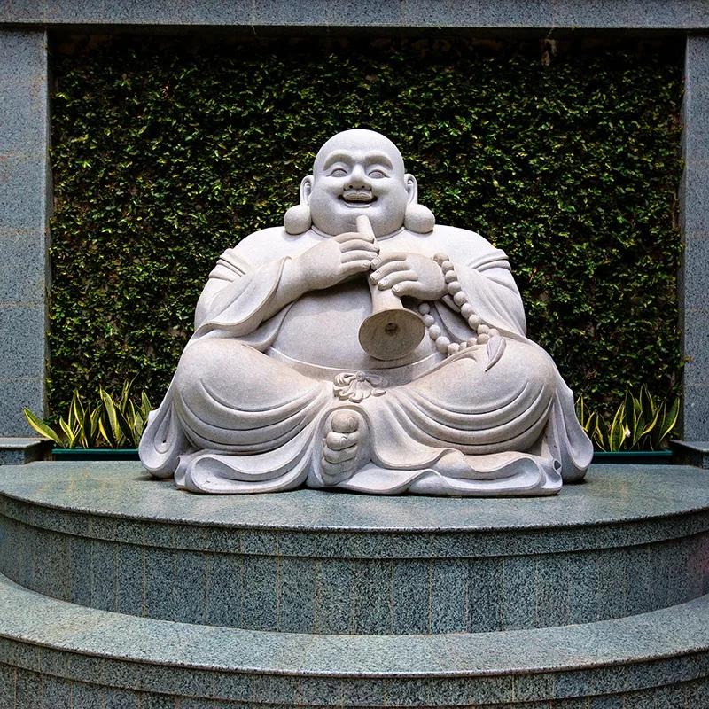 laughing buddha garden statue
