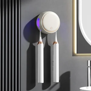 New Design Wall Mounted UVC Toothbrush Sterilizer for Two with Heating Drying Function Multi-Purpose Teeth Whitening Accessory