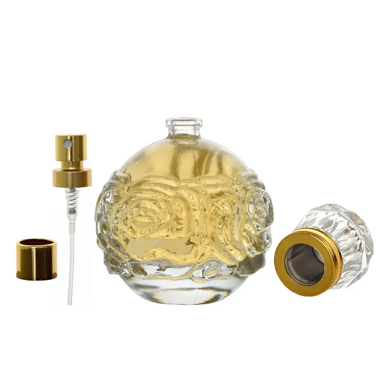Customized 100ml 110ml 120ml Fancy Luxury High Quality Islamic Dubai Engraved Perfume Empty Spray Pump Clear Glass Parfum Bottle