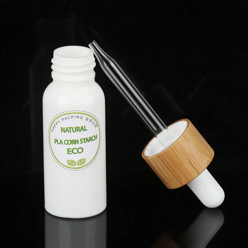 Natural 50ml 100ml PLA Material Polylactic Acid Biodegradable Lotion Bottle with Bamboo Cover for Shampoo