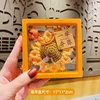 pendentif-tournesol (gagner d'un seul coup) boîte de suspension orange