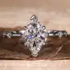 marquise side-stone ring