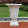 semplice vaso da fiori a strisce verticali