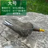 Large gray spoon head, yellow screw