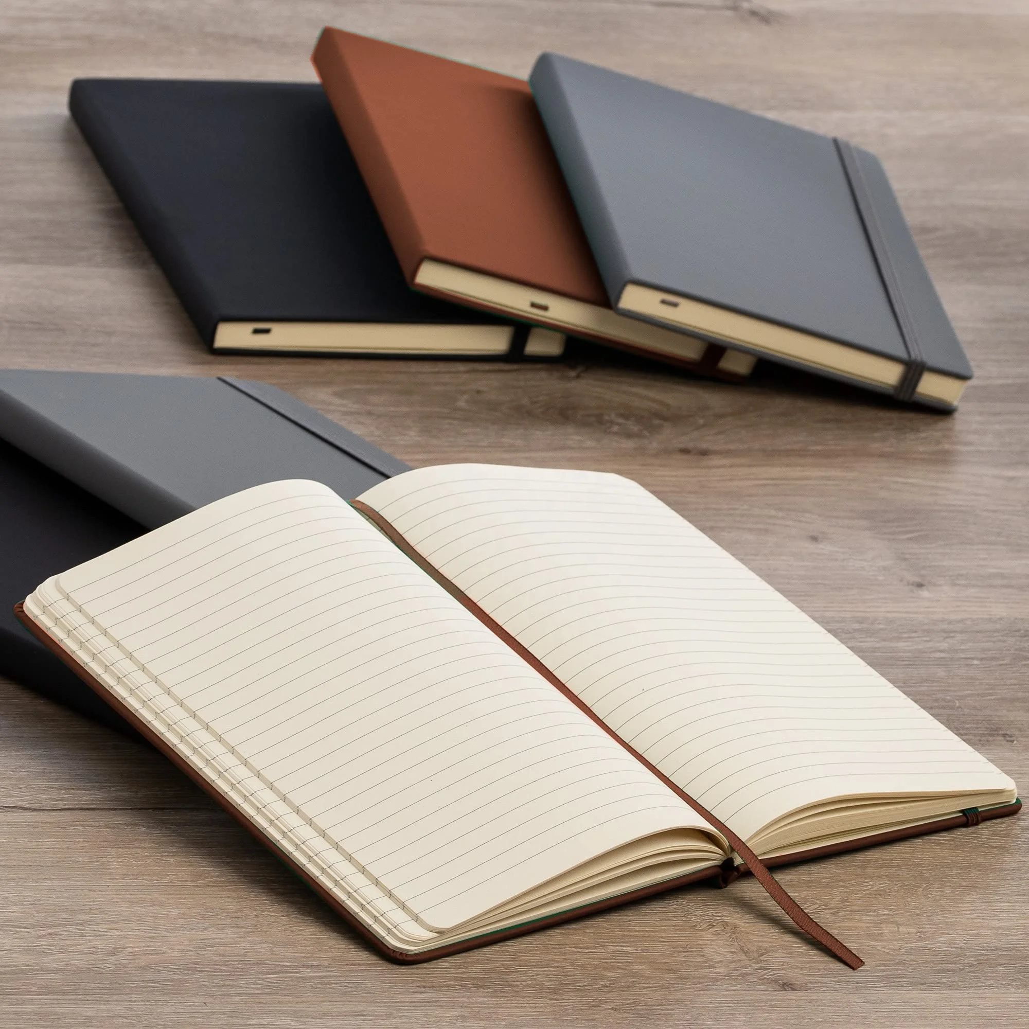 FSC Certified Low MOQ Black Notebooks with Custom Gold logo on Front Oem Planner and Journal Hard Cover A5 PU Leather Notebook