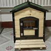 Natural wood color with green roof -- Property purchase