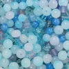 Blue-toned bursting glass beads