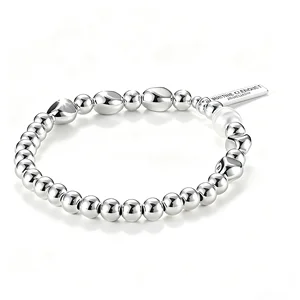 Women's Silver Tone Beaded Bracelet with Pearl Minimalist Elastic Design Fashion Jewelry for Daily Wear Trendy Accessory Gift