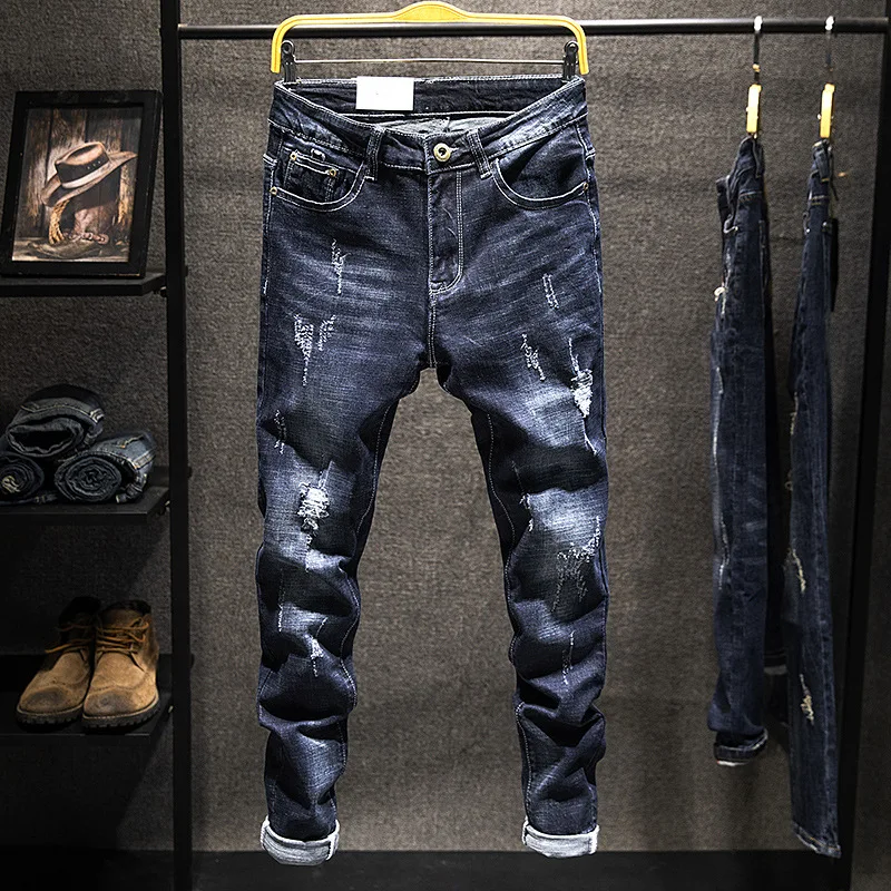 Nuovo inverno elasticizzato strappato moda versatile versione coreana slim semplice uomo piccolo piede pantaloni jeans uomo 2024_voghion.com