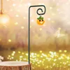 Small glow-in-the-dark orange flower vase