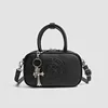 Nero con ciondolo a forma di borsa