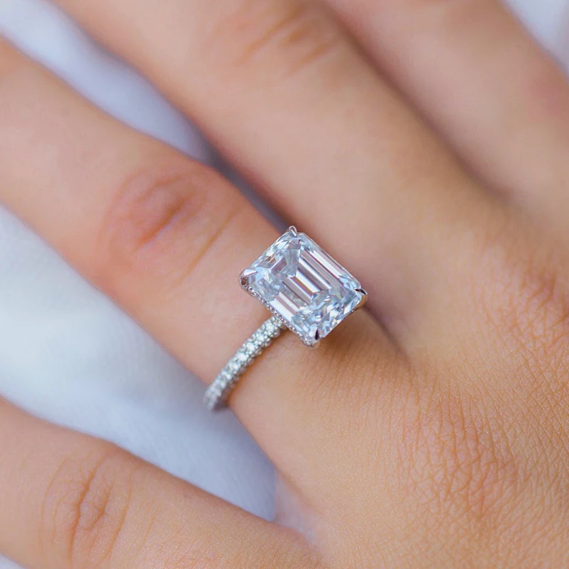 Coki Bijoux Fine Jewelry—14k Yellow Gold Ring with Emerald Cut Moissanite