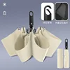 Paraguas plegable automático con hebilla de anillo blanco de arroz, tela táctil