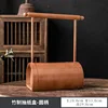 Walnut-colored tissue box with round handle