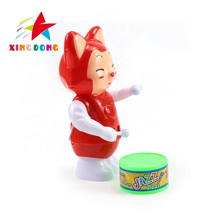 Wholesale custom wind up toys cute mini cartoon boy beat a drum