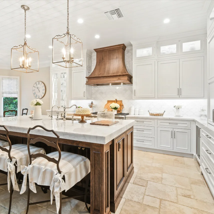 Gorgeous French Country Style Kitchen Design Featuring a Rustic Cherry Hood With Coordinating Island and White Inset Cabinetry