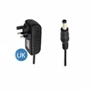 Adaptador de corriente con enchufe británico negro