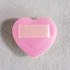 Pink heart-shaped marshmallow finger puff
