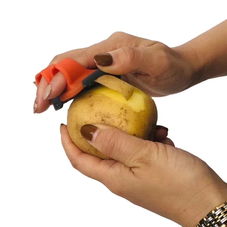 Popular Smart Kitchen Gadgets Plastic Stainless steel double finger apple  fruit palm peeler Vegetable peeler