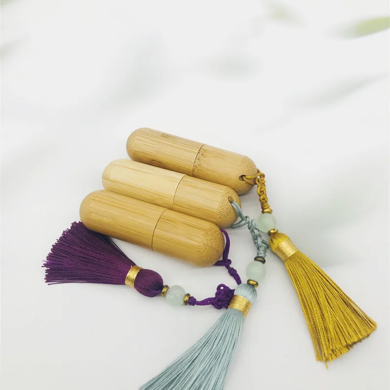 New Style 1ml 2ml 3ml 5ml Cute Refillable Bamboo Roller Bottle Essential Oil with Steel Roller Ball and Tassels