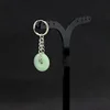 E027-Green1 (there are ear holes earring)