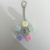 Colorful rotating button keychain with heart design