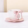 Pink bowknot cup and saucer set