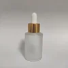 frosted bottle + shiny gold aluminum ring + white rubber head