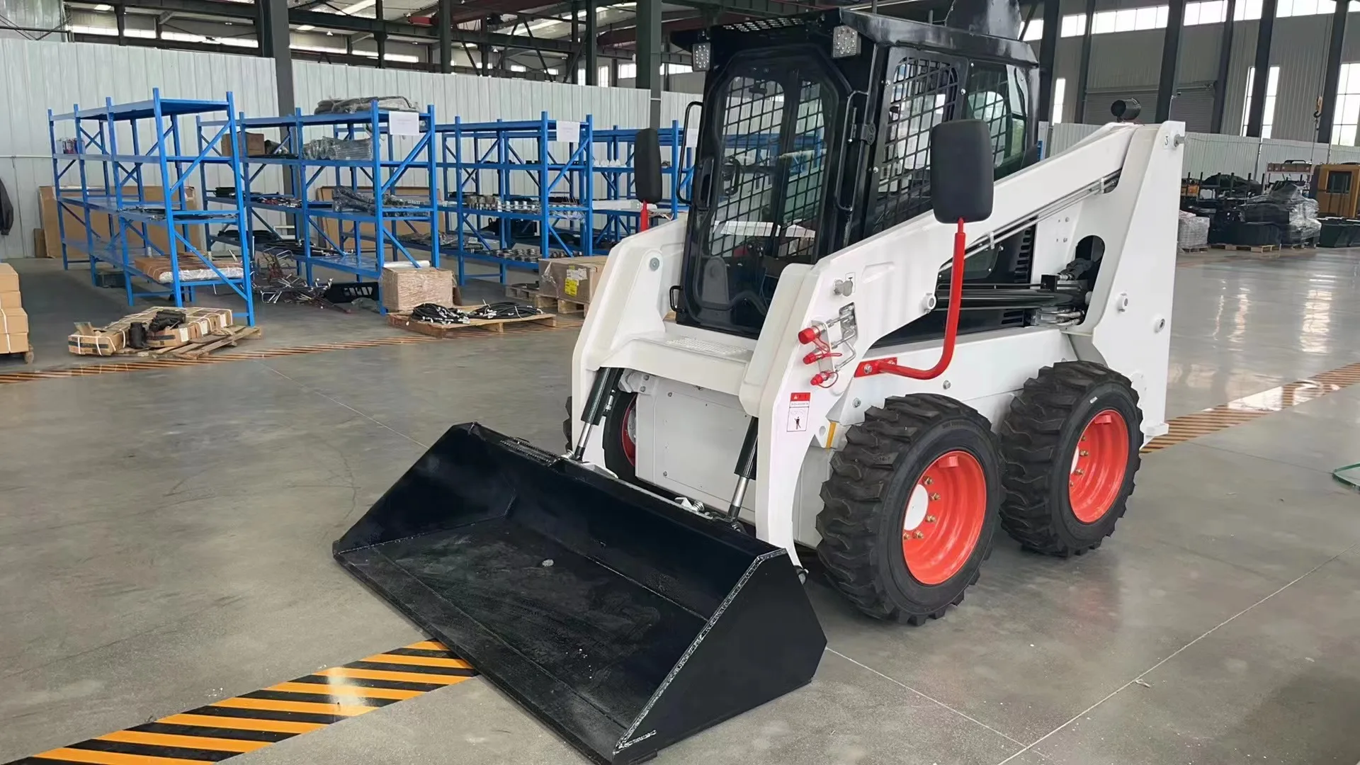 china cheap mini skid steer loader with track hydraulic control wheel skid steer loader attachment with 4 in 1 bucket manufacture